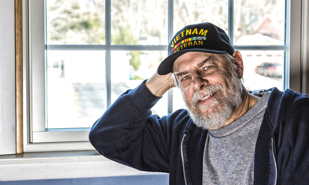 Vietnam Veteran At Home By Window