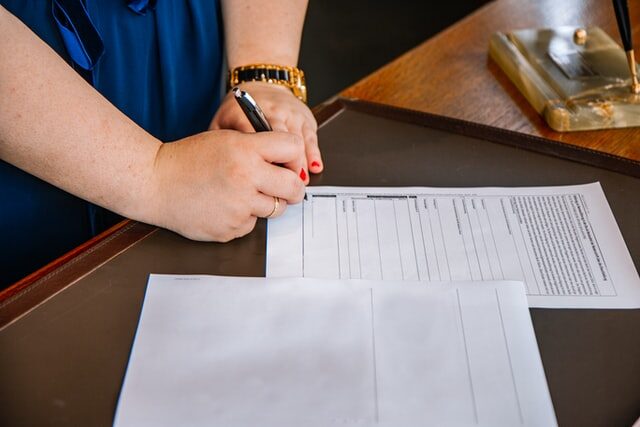 A mortgage lender in NY checking the loan paperwork