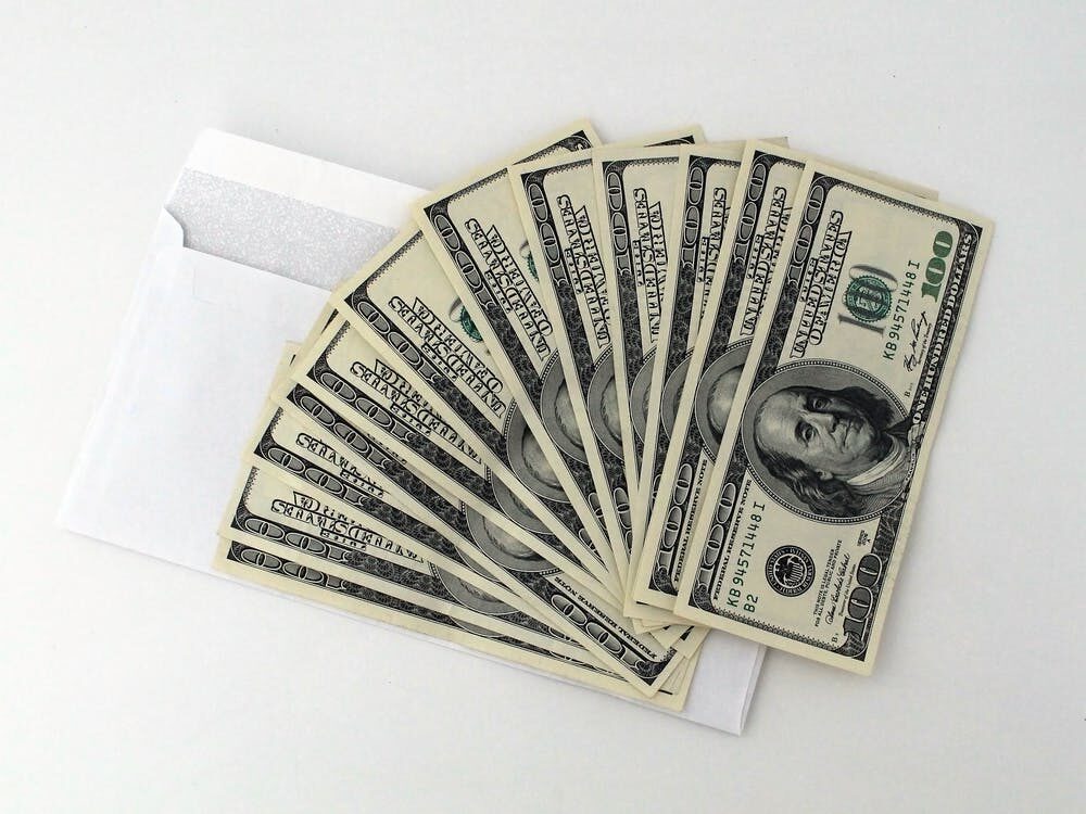 dollar bills on a table