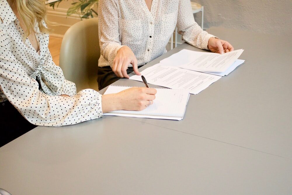 A woman securing Non-Conforming Mortgage Loans in NY from a leading mortgage refinance company, Atlantic Home Capital