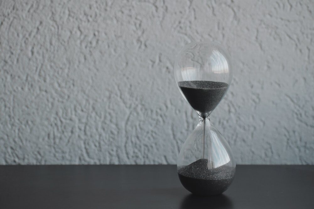 Sand falling in an hourglass