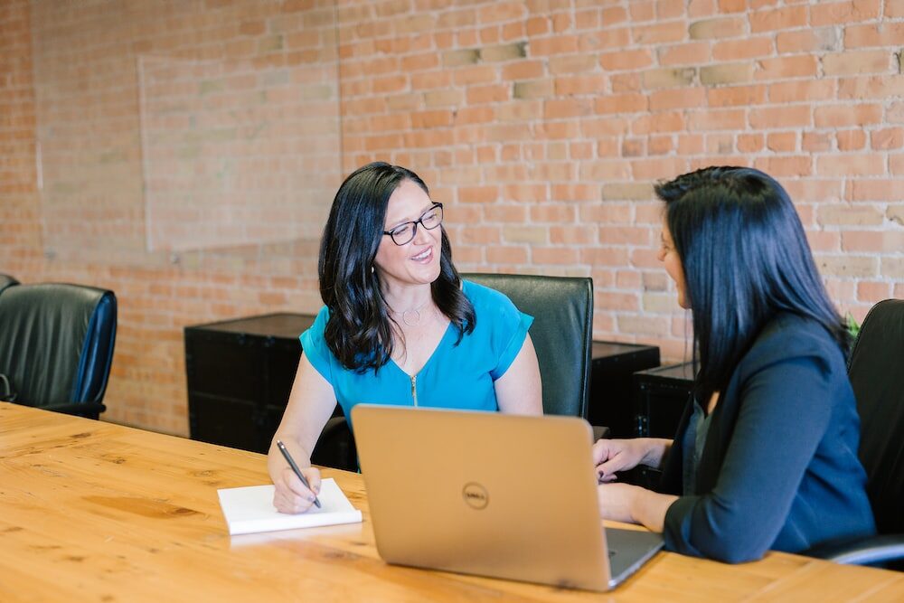 Two women sitting and having a conversation